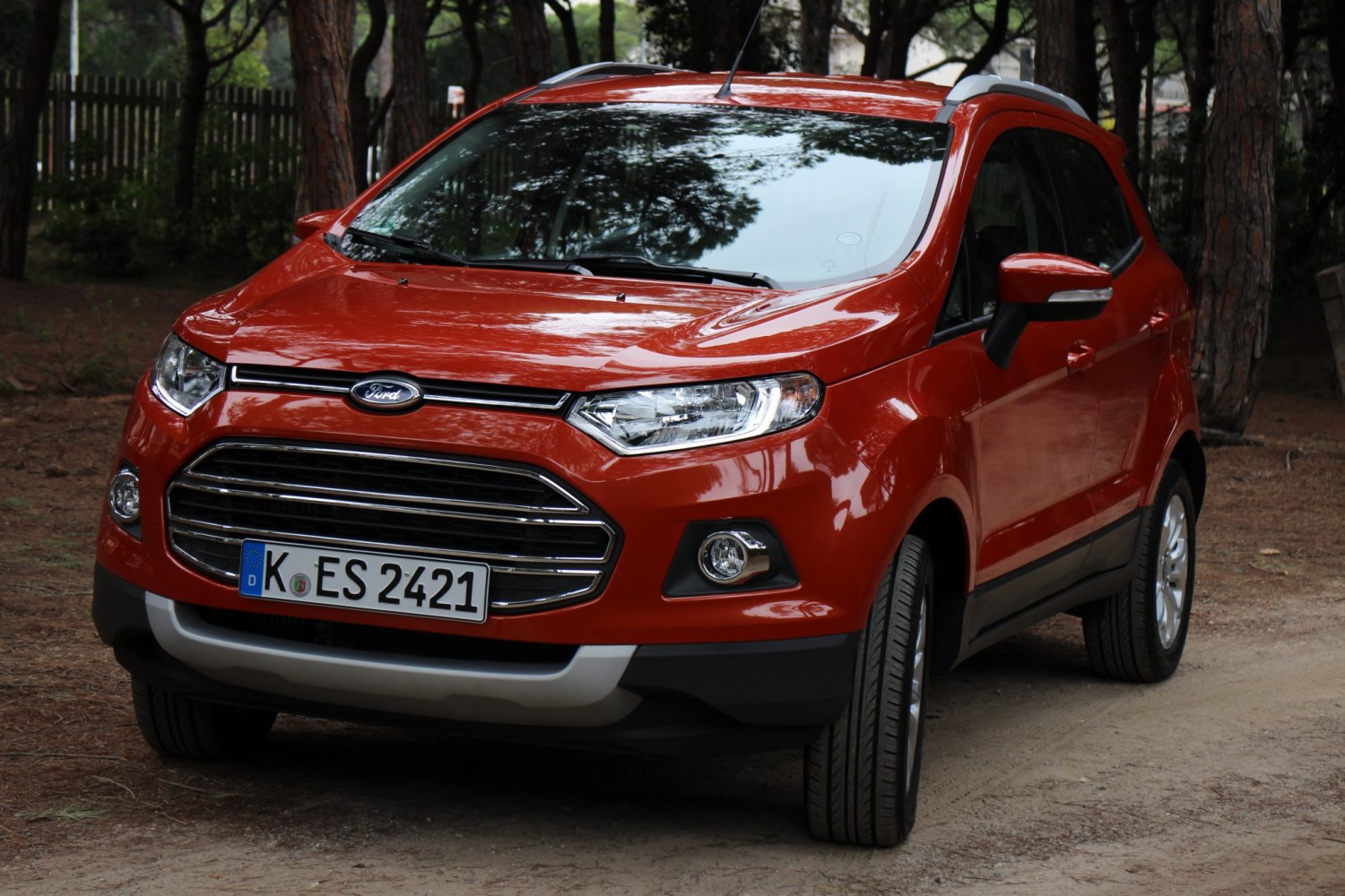 Compact SUV front with bold grille and sharp headlights