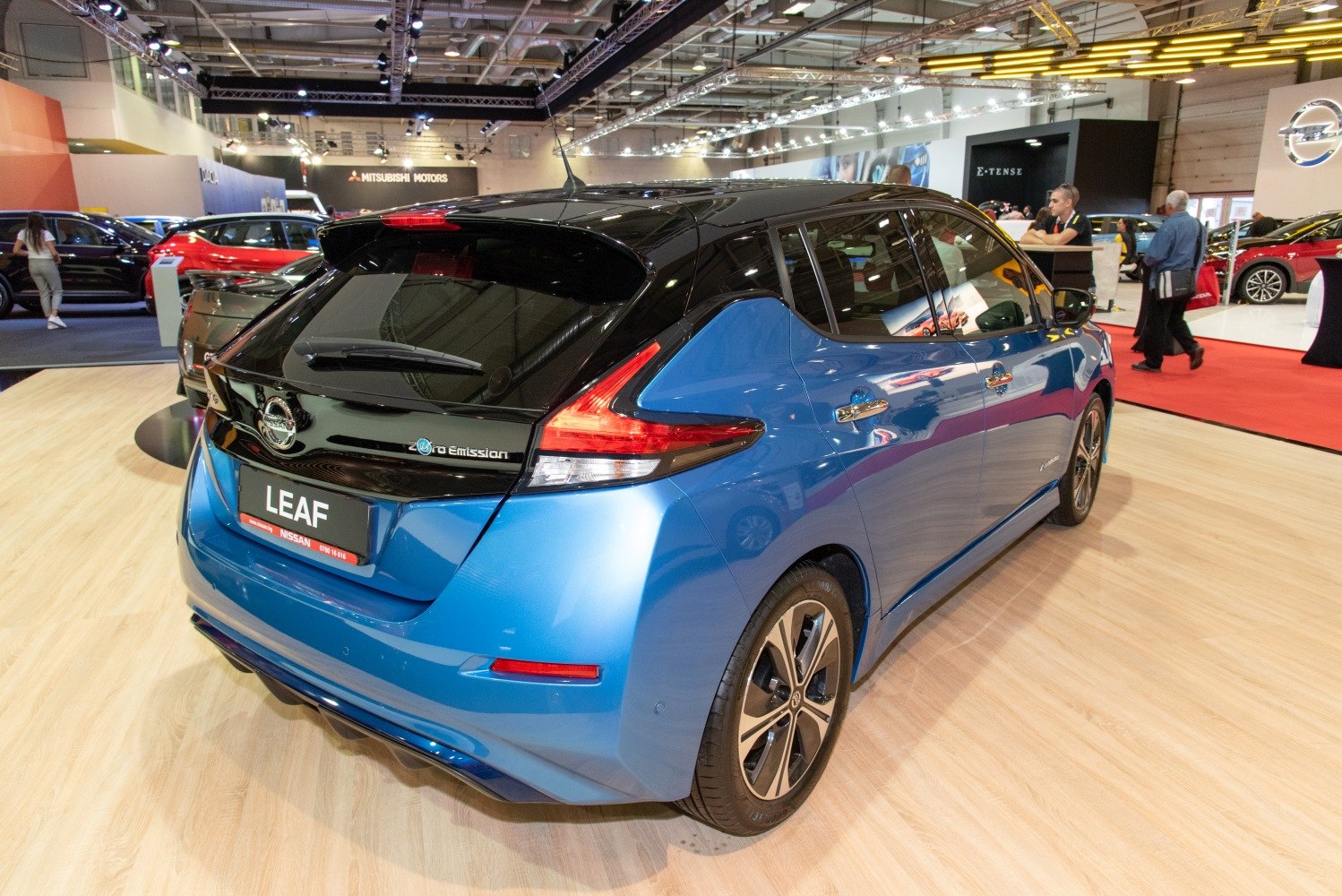 Blue electric hatchback rear with black roof and modern tail lights