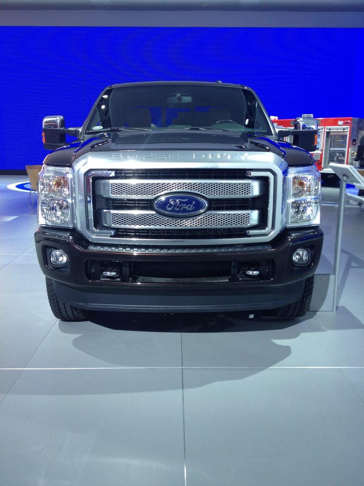 Front view of a heavy-duty pickup with chrome grille and dual headlights.