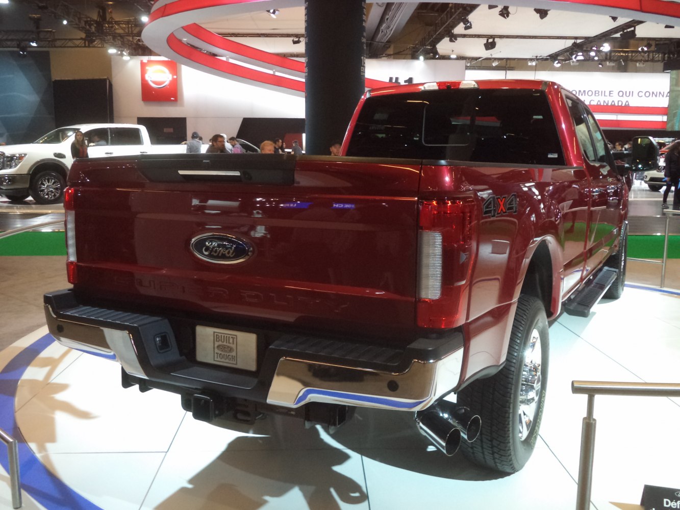 Rear view of pickup with long cargo box and 4x4 badge