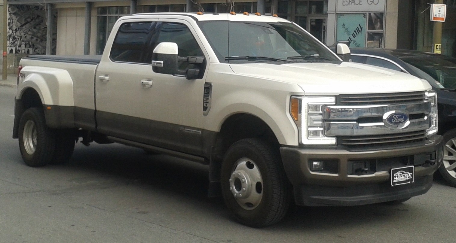 Heavy-duty truck with extended crew cab and dual rear wheels