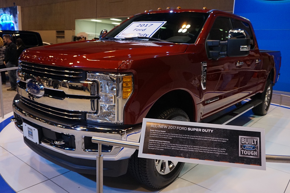 Front view with chrome grille and headlight design of a heavy-duty truck