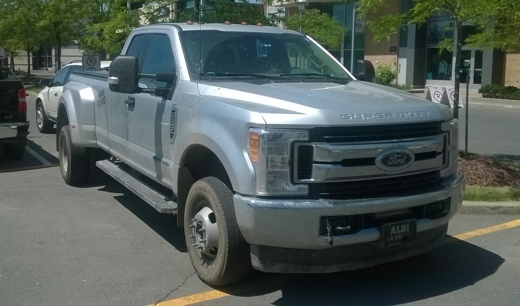 Heavy-duty pickup truck with Super Cab and long box bed.