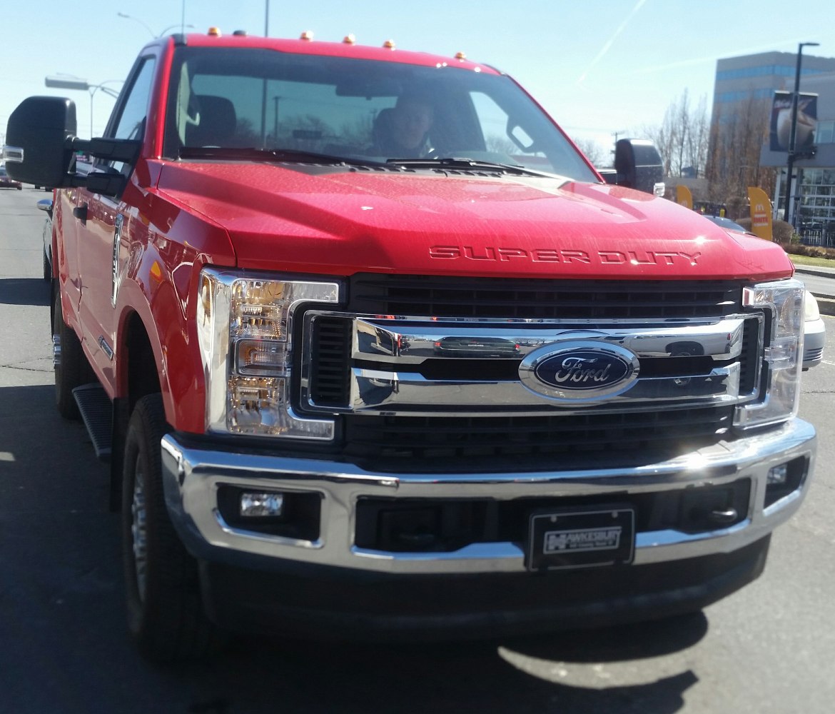 Front view of heavy duty pickup with bold grille and headlights