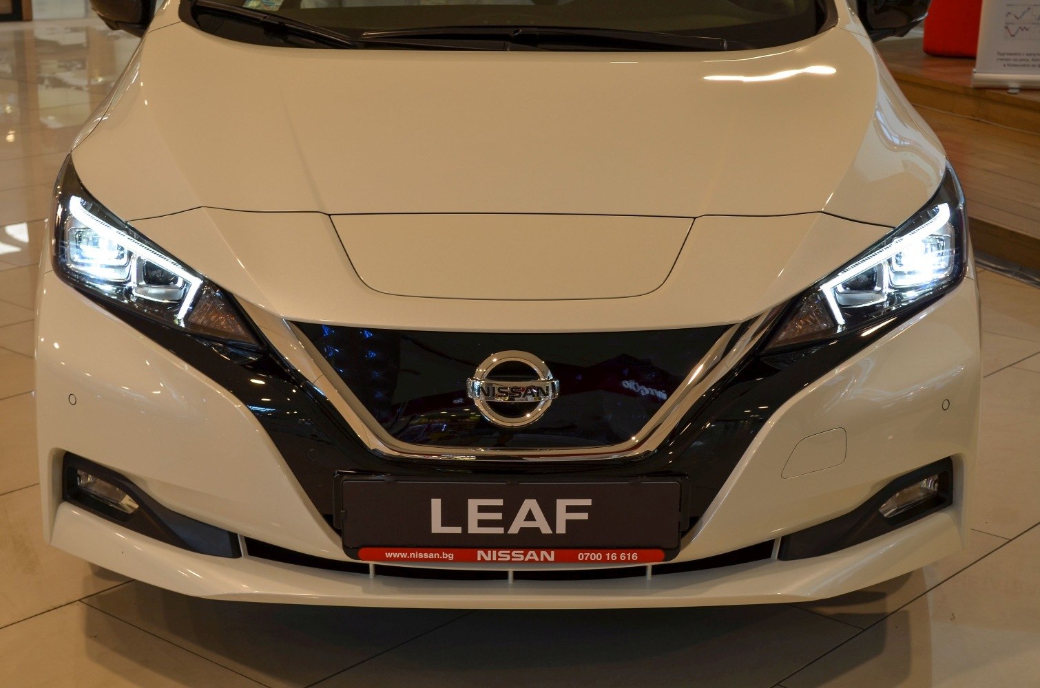 LED headlights and front grille close-up