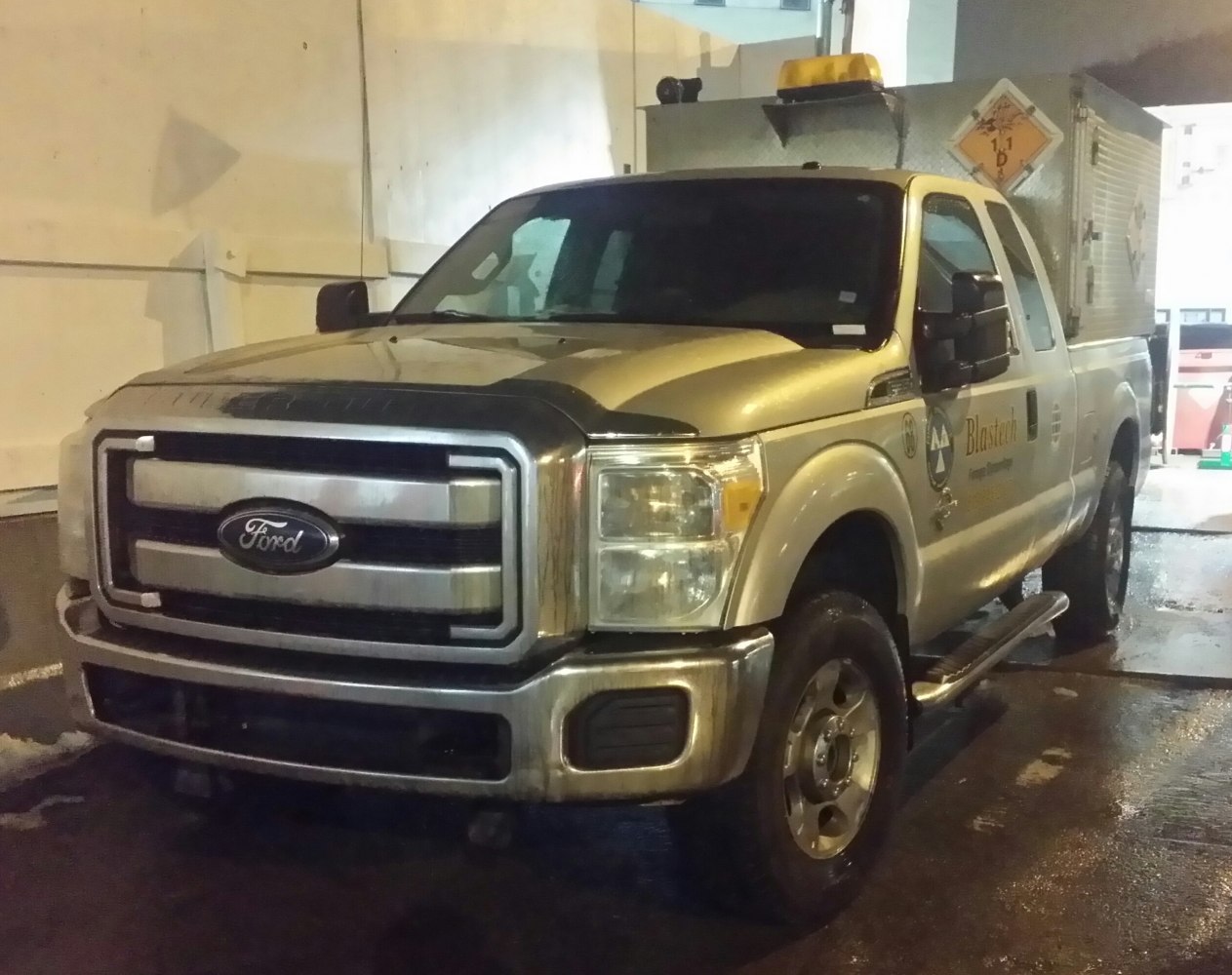 Heavy-duty pickup with utility box and large grille front