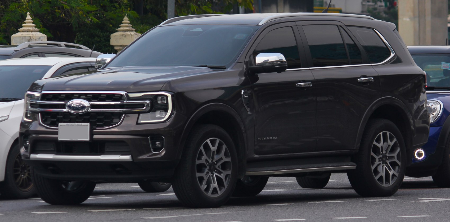 Modern SUV front and side profile with LED headlights and chrome trim.