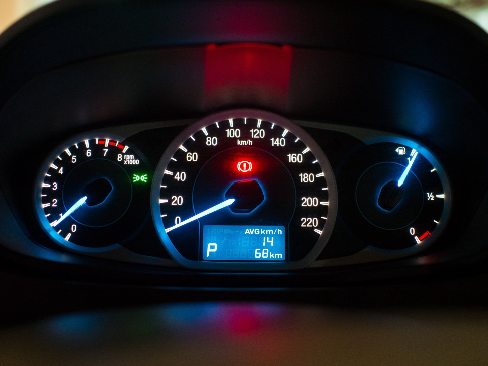 Dashboard instrument cluster with speedometer, tachometer, and fuel gauge