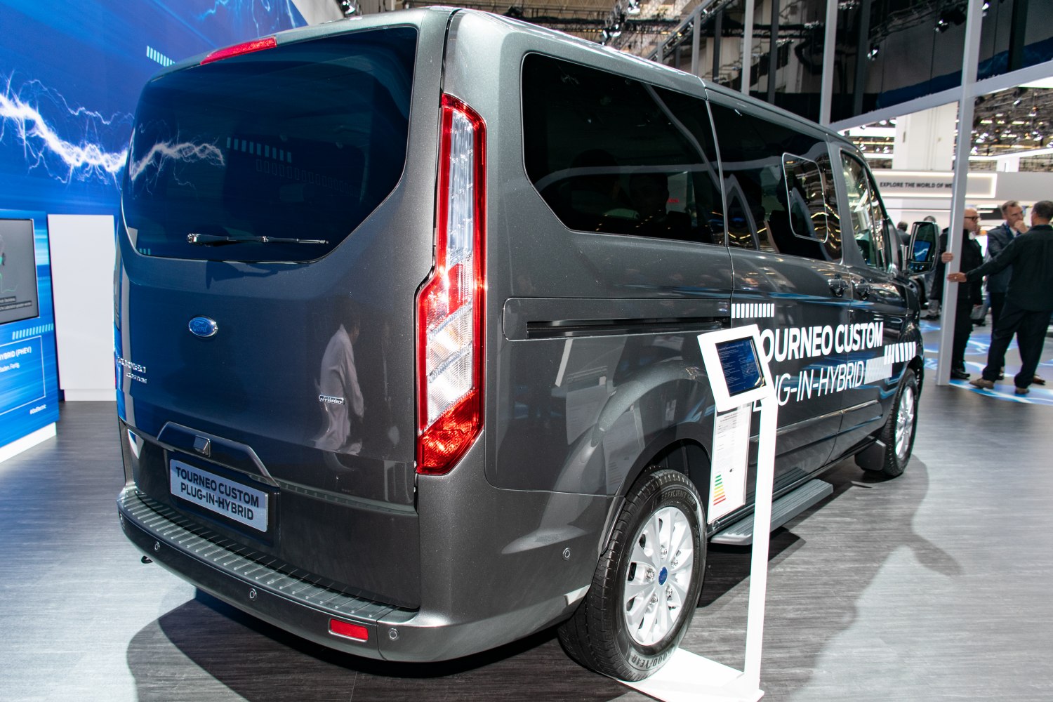 Rear and side view of plug-in hybrid van with large windows and vertical tail light