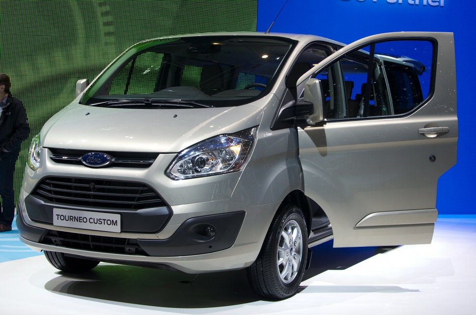 Front angled view with open passenger sliding door