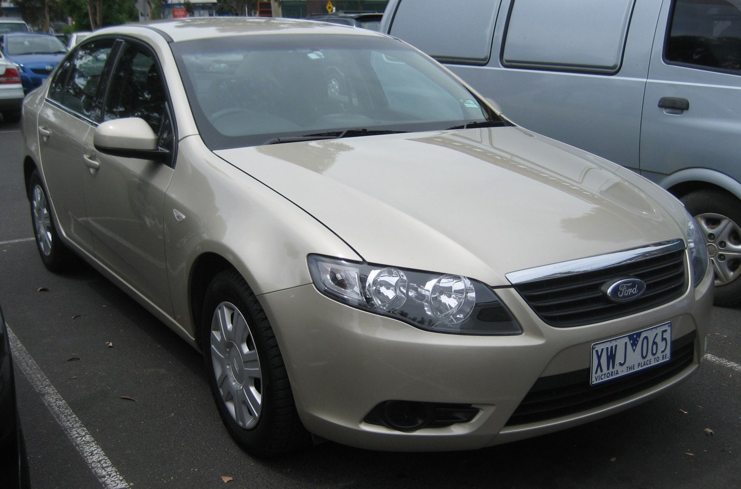 Sedan front view with distinctive headlights and grille