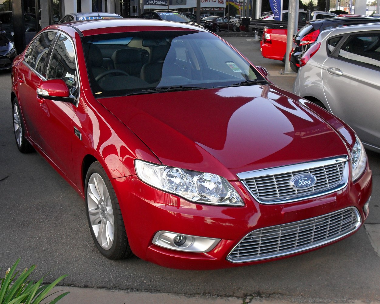 Front view with chrome grille and clear headlights