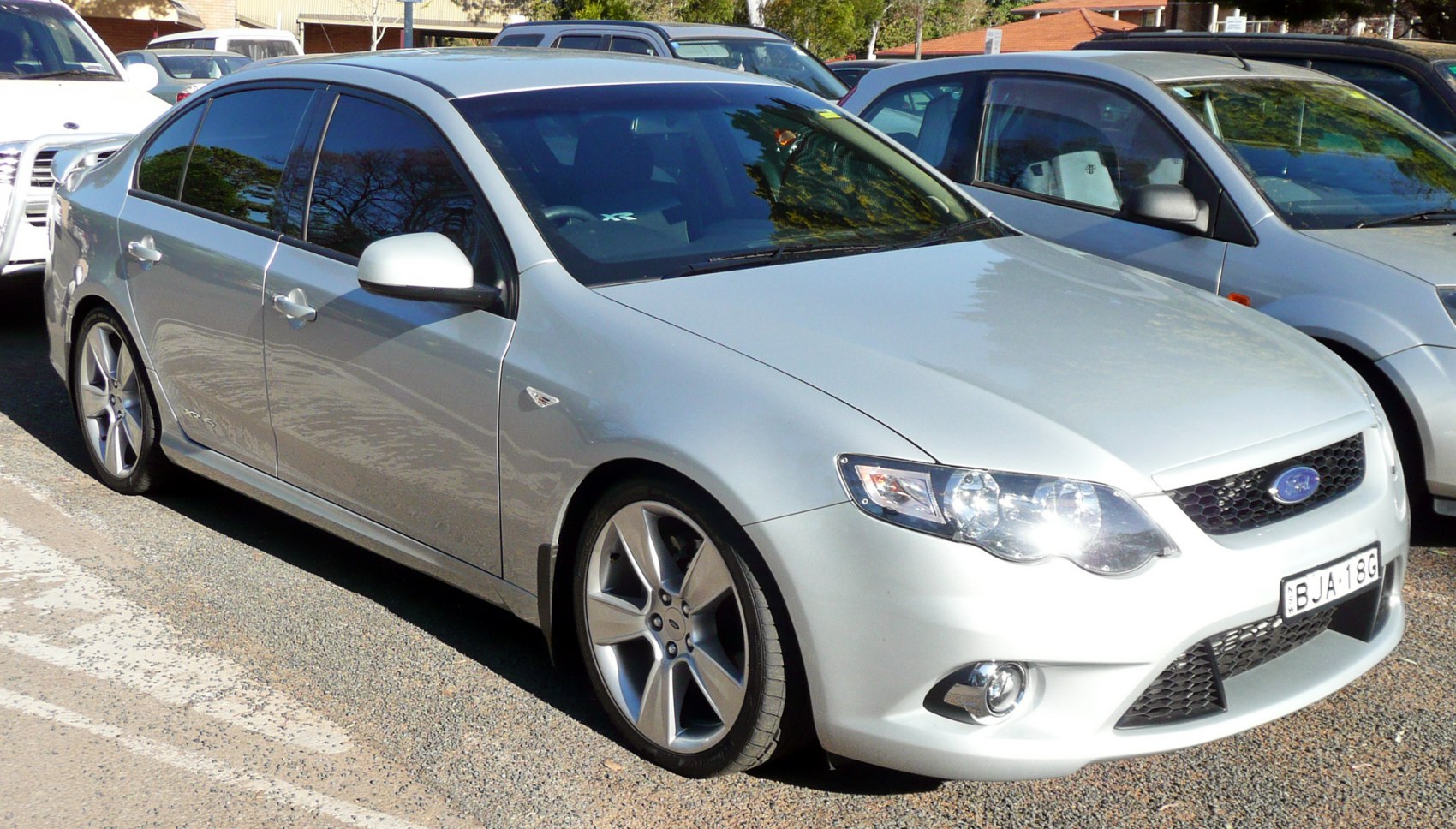 Silver sedan with alloy wheels and tinted windows