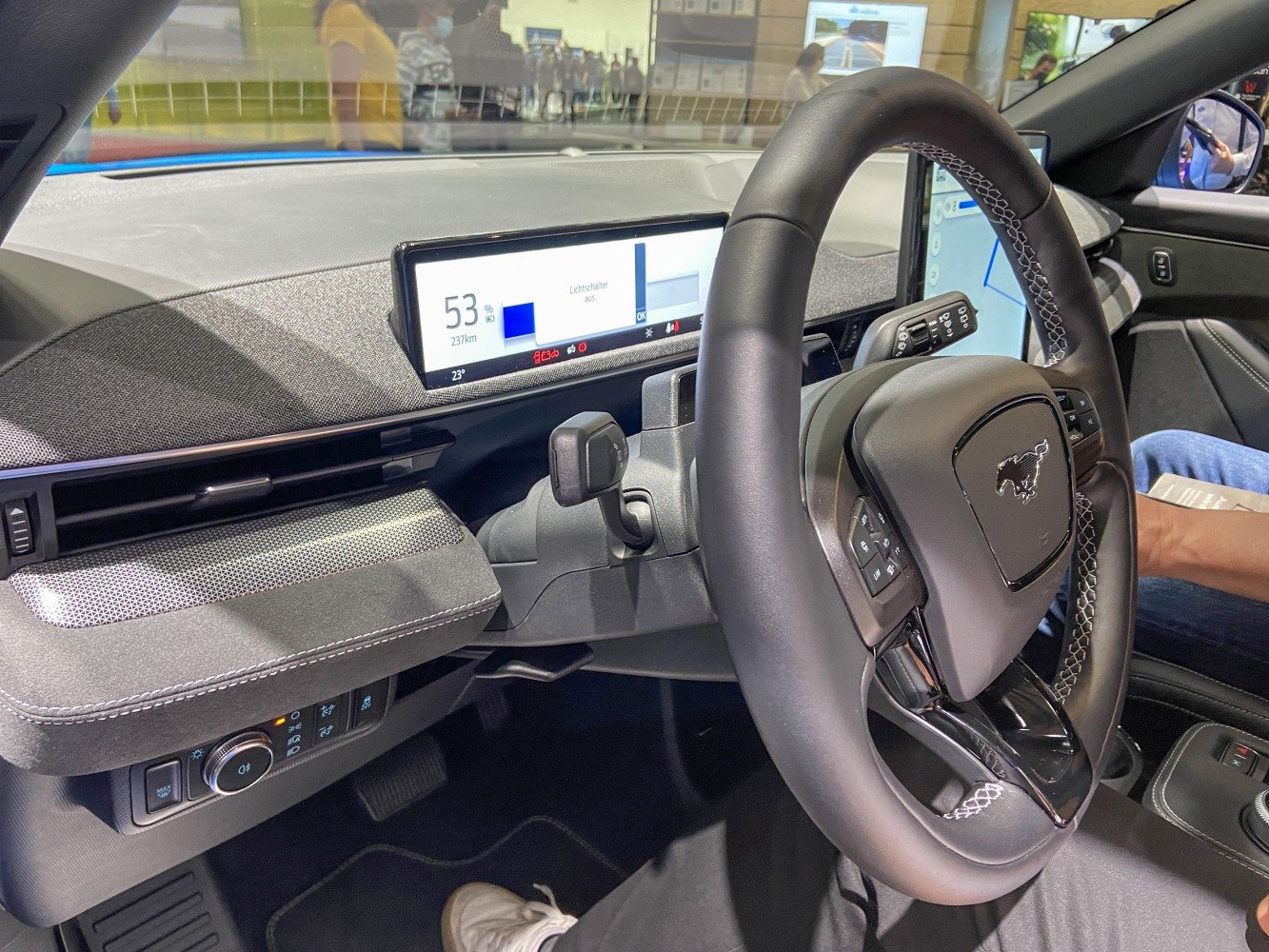 Digital dashboard and multifunction steering wheel in modern electric vehicle interior