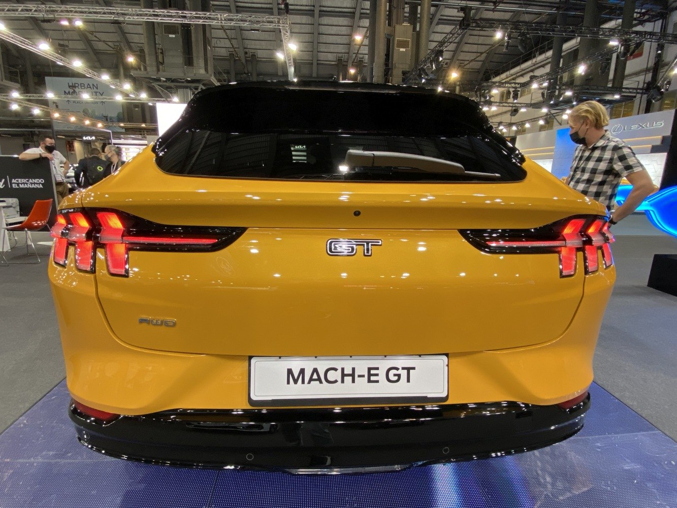 Rear view of electric SUV with triple-bar LED tail lights and GT badge