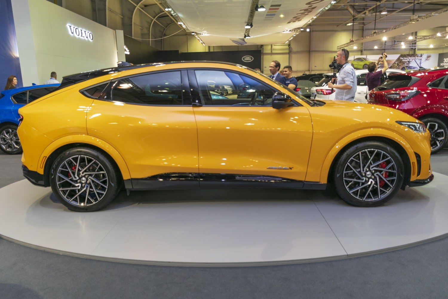 Side profile of an electric SUV with sporty alloy wheels and sleek design