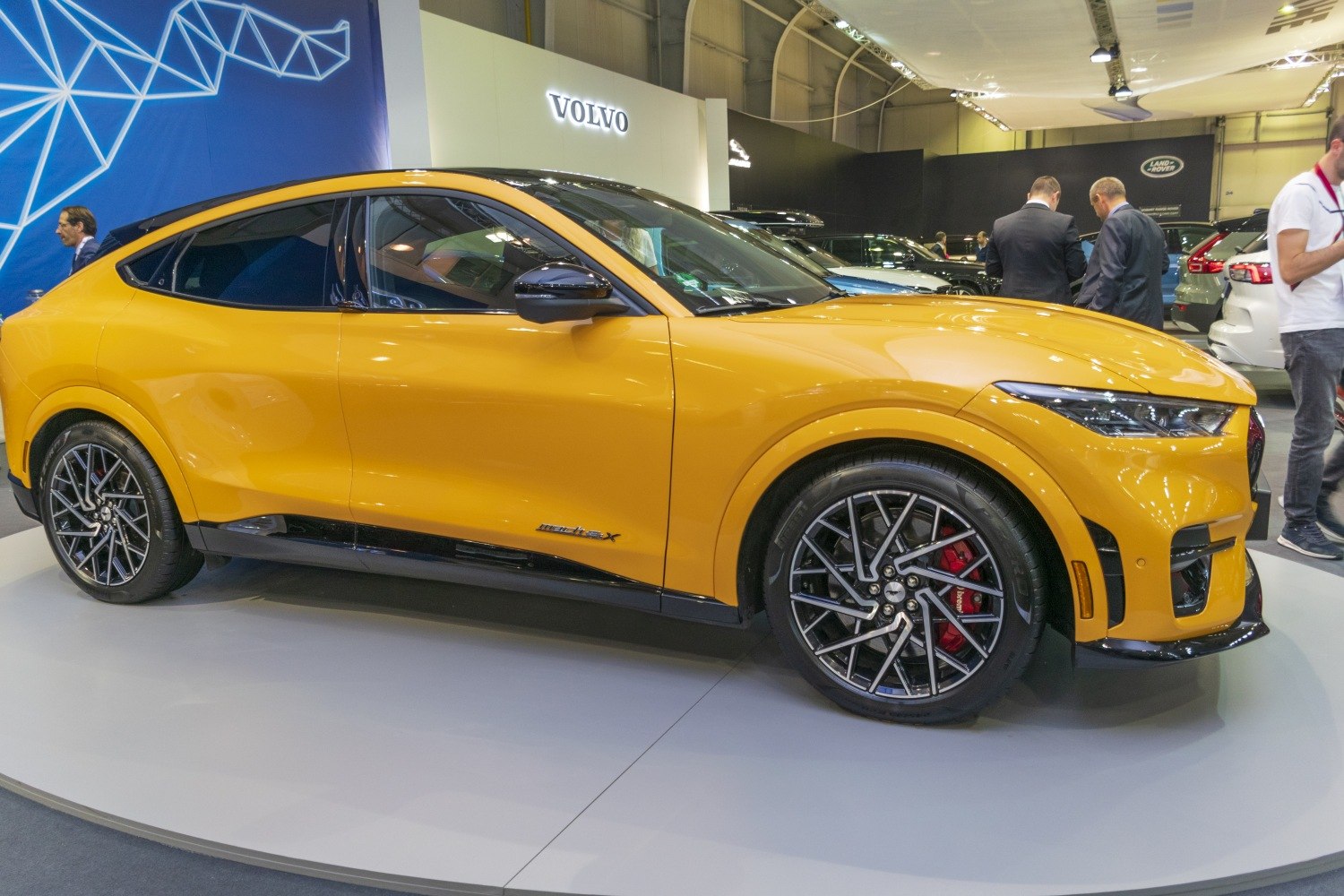Yellow electric SUV with multi-spoke alloy wheels