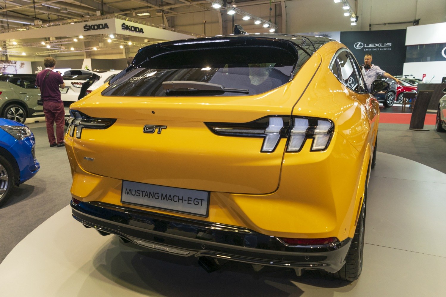 Rear view with GT badge and distinctive triple-bar taillights