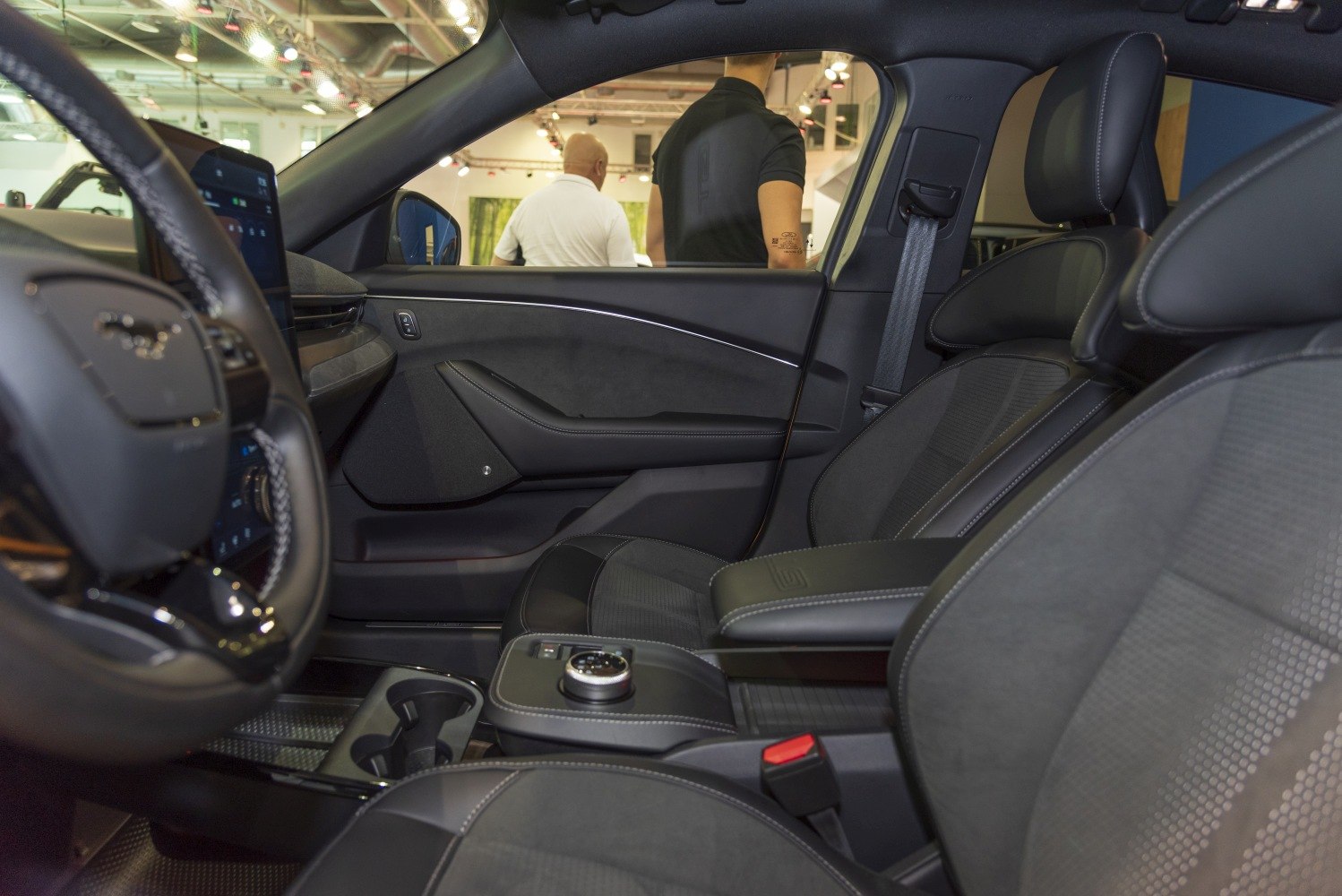 Modern car interior with dashboard, seats, and central controls