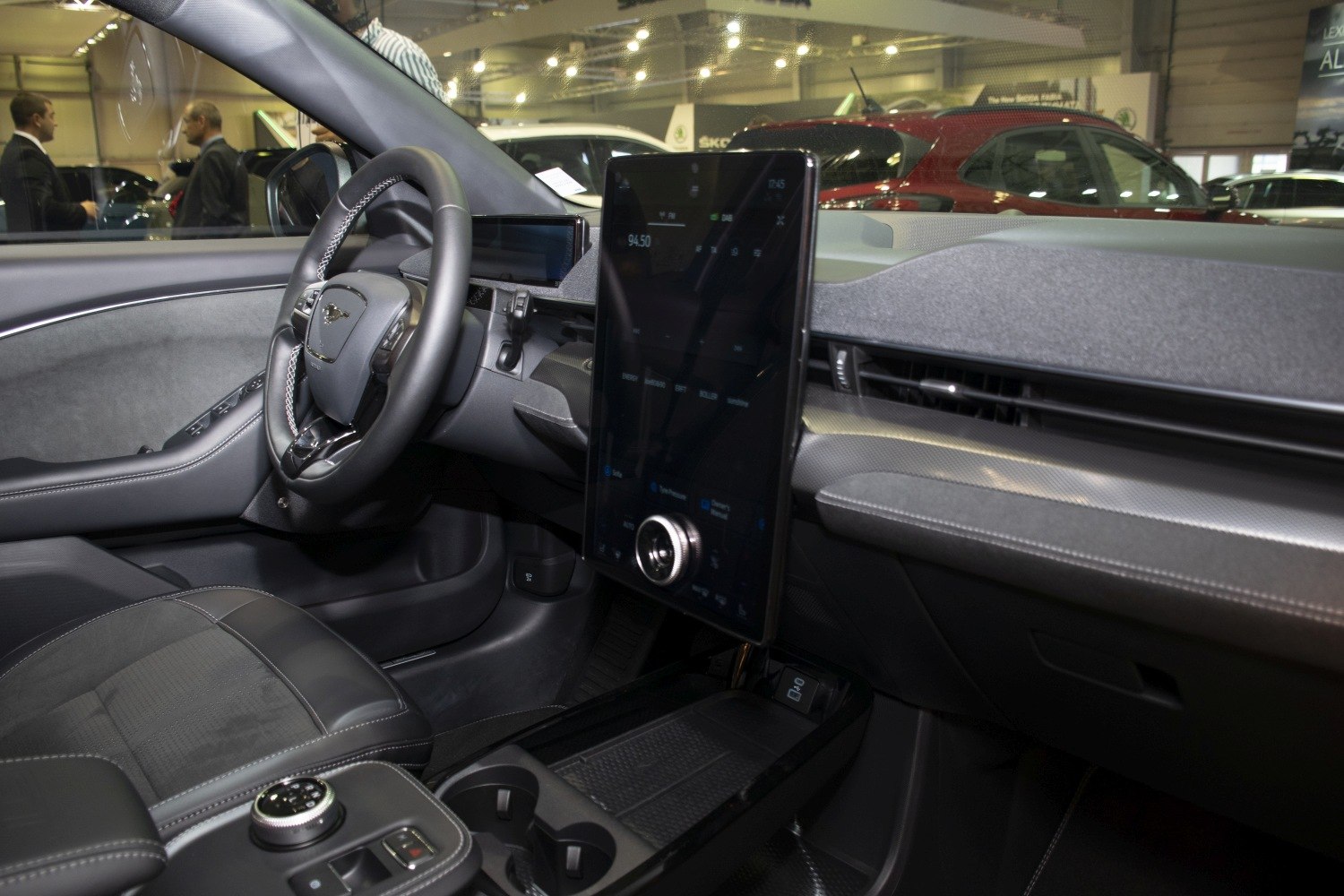 Interior with large vertical touchscreen and modern steering wheel