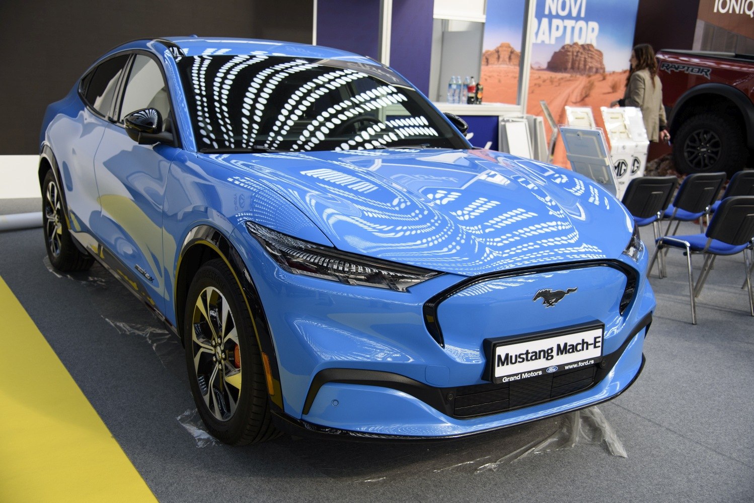 Sleek front view with sharp LED headlights and aerodynamic body styling