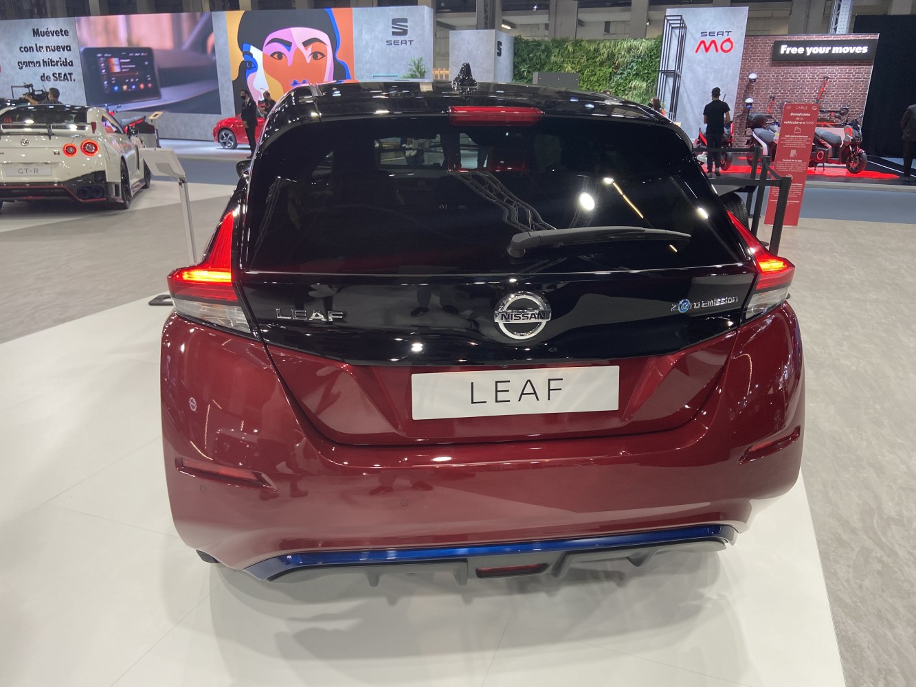 Rear view of electric hatchback with LED taillights and zero emission badge