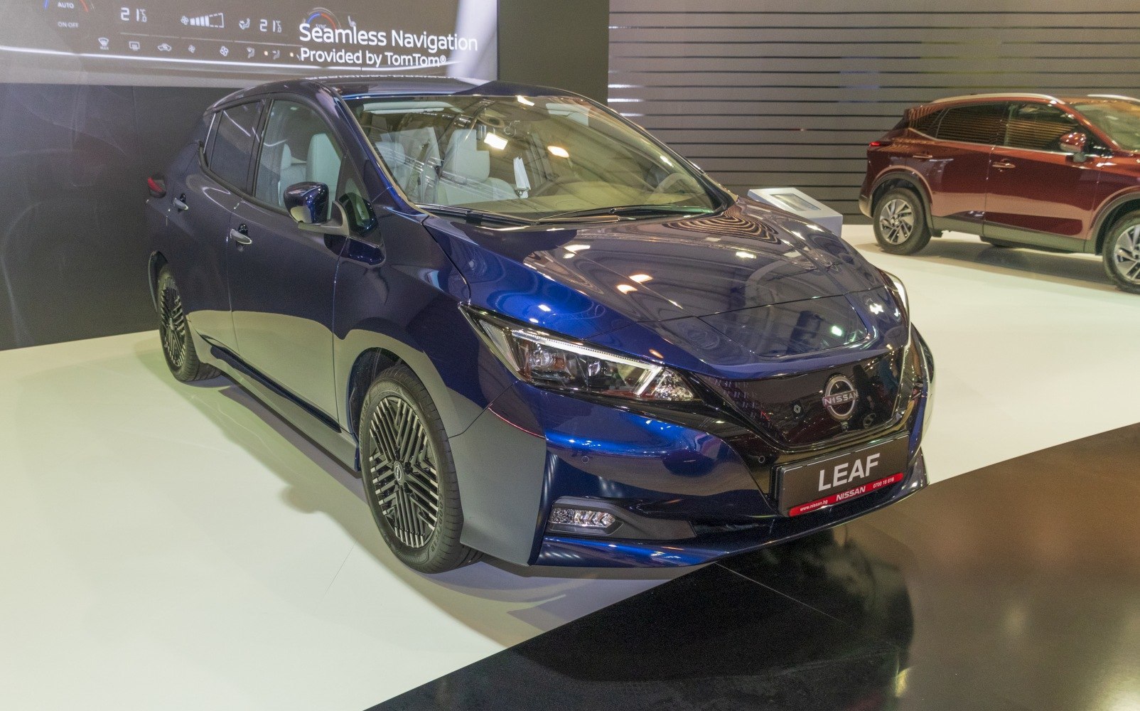 Electric hatchback with sharp headlights and aerodynamic front design