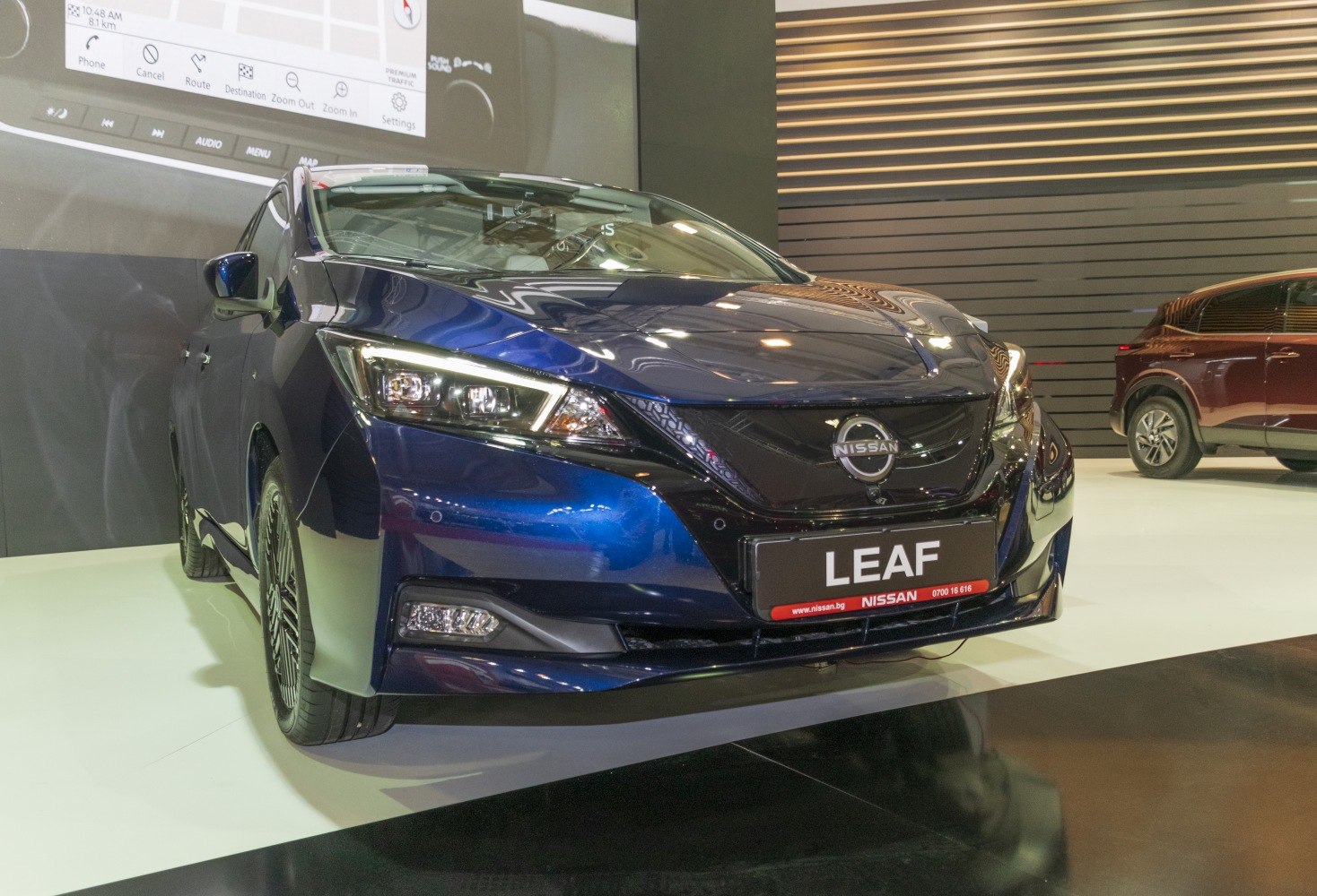Front angled view with LED headlights and sleek bumper