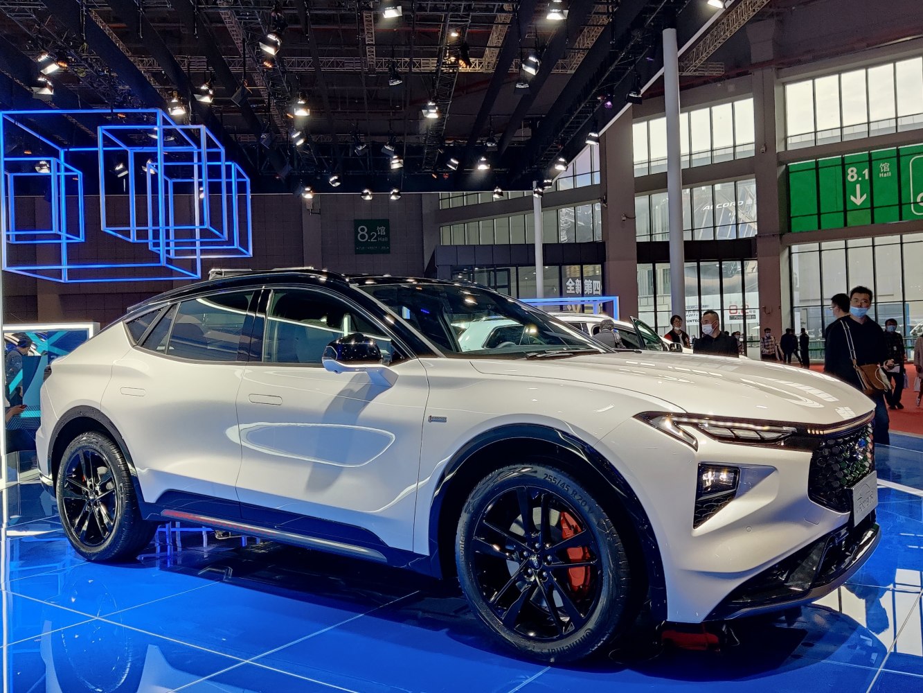 White crossover with black roof, black wheels, and LED headlights