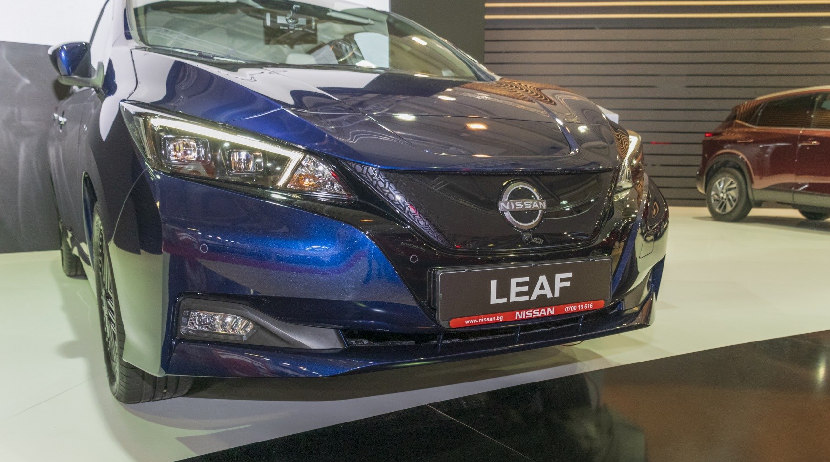 Close-up front view with LED headlights and aerodynamic styling