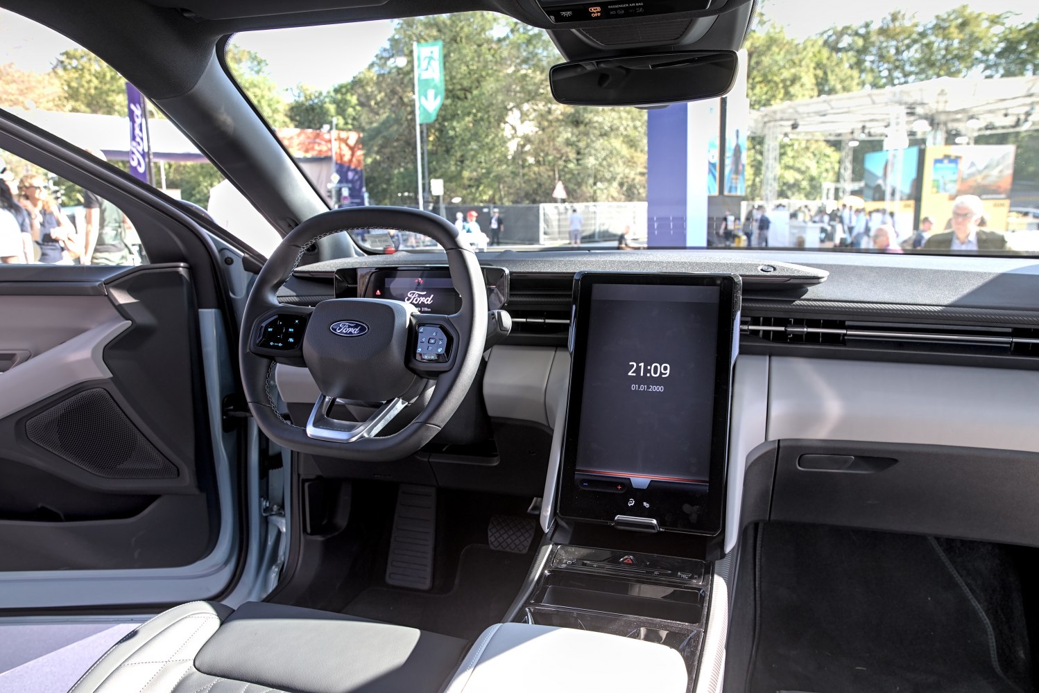 Digital instrument cluster and large vertical infotainment touchscreen