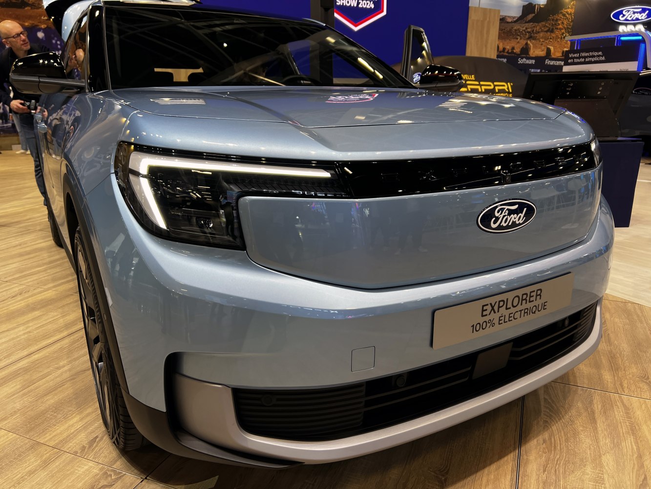 Front close-up of electric SUV with LED headlights and Ford oval logo