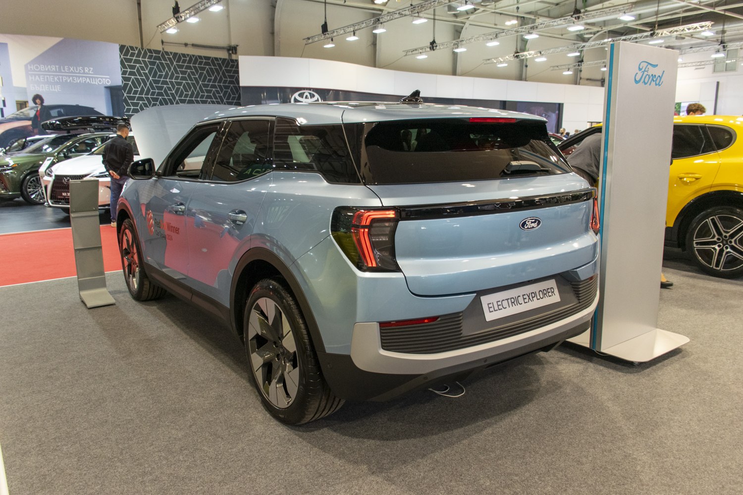 Rear view of modern electric SUV with distinctive tail lights.