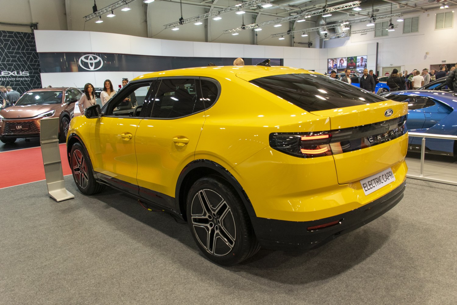 Electric coupe SUV rear view with LED tail lights and aerodynamic design