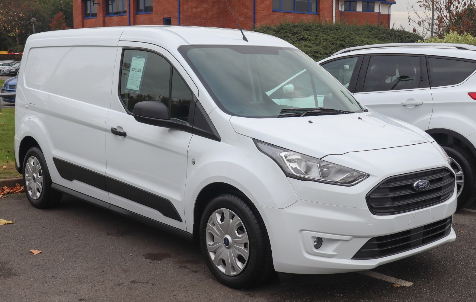 Panel van L2 front and side view with black grille and smooth cargo body