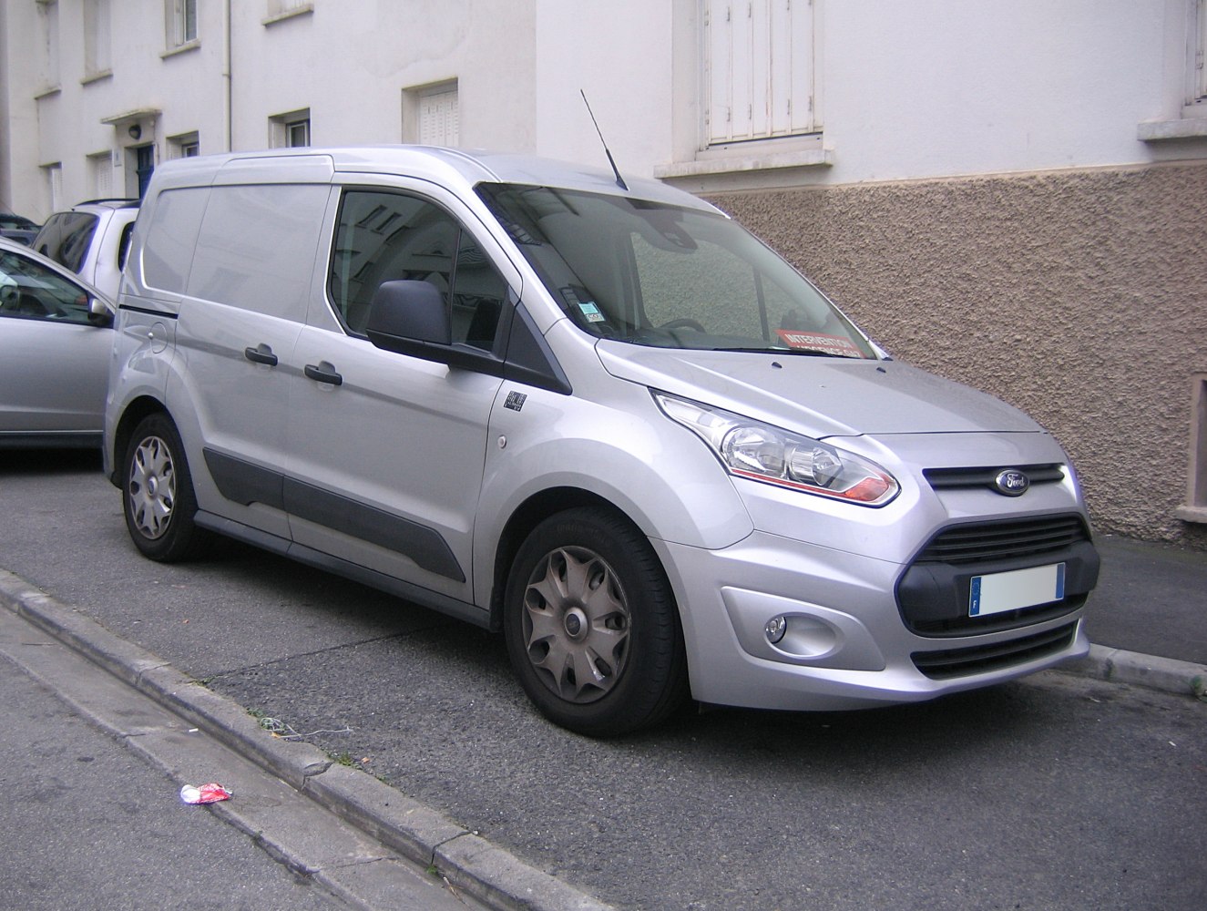 Silver compact panel van with sliding side doors and black trim