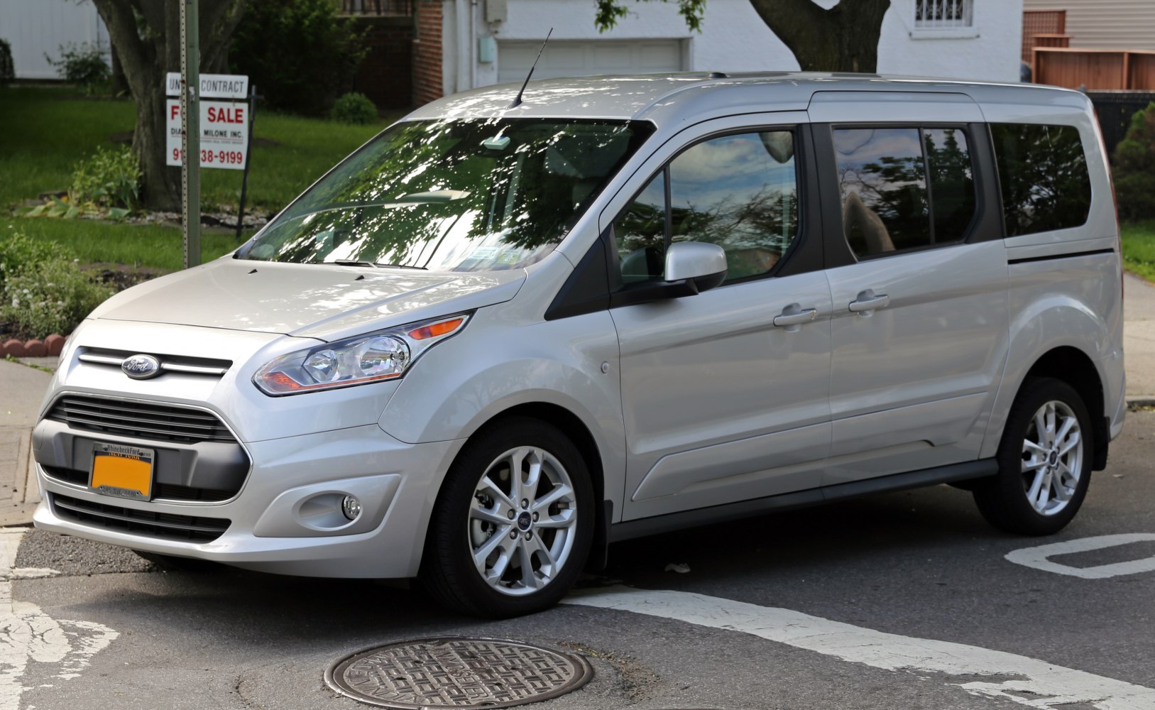 Silver compact van with modern headlights and alloy wheels