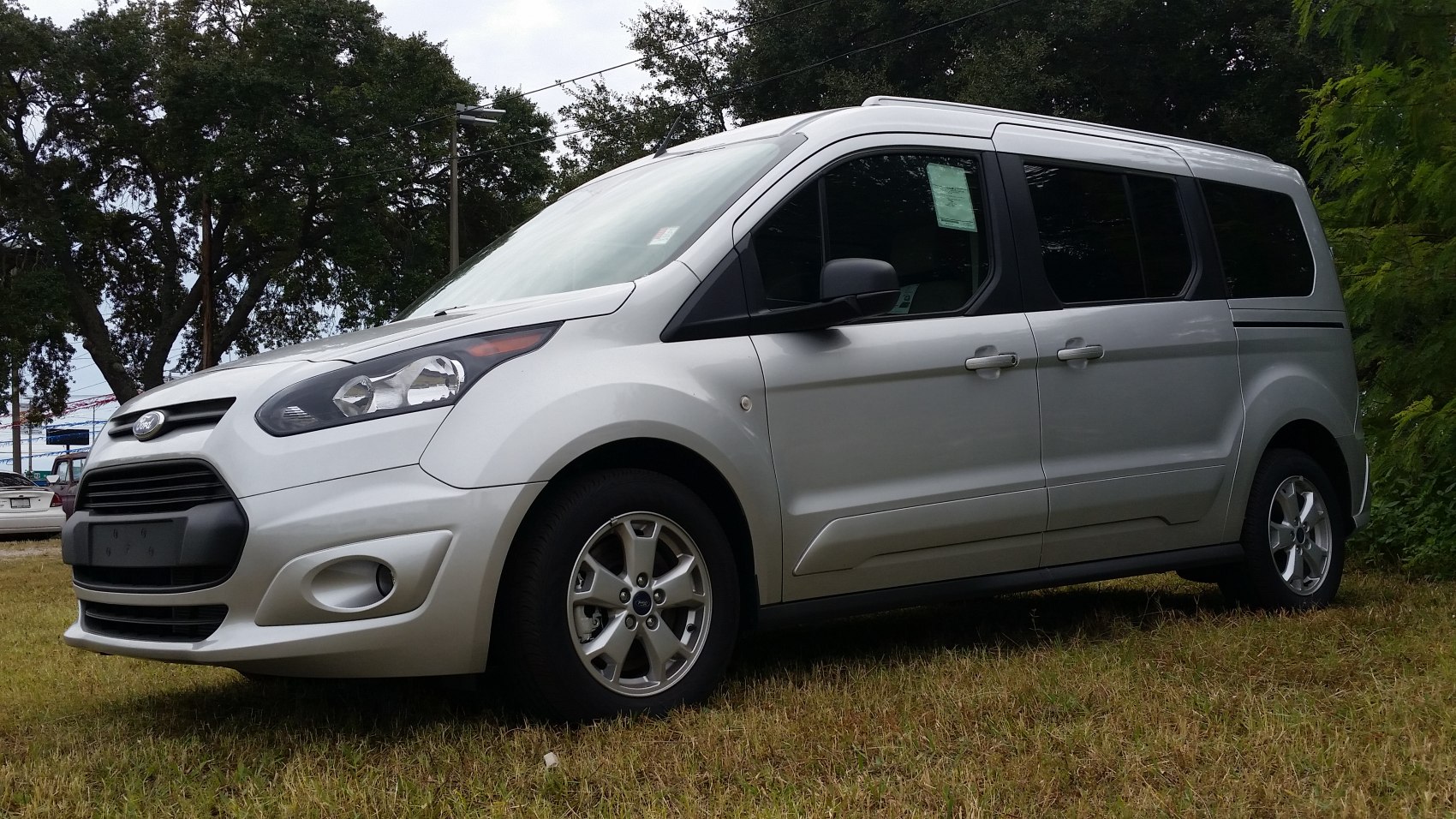 Silver compact van with alloy wheels and side profile