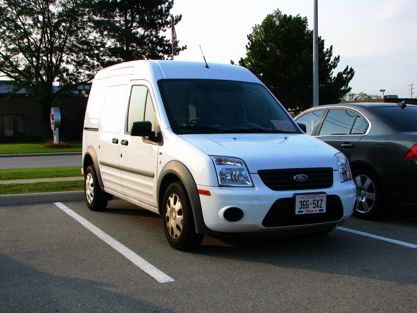 White panel van with L2H2 high roof and side sliding door