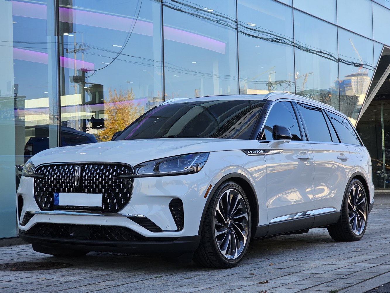 Front grille and LED headlights of a modern luxury SUV