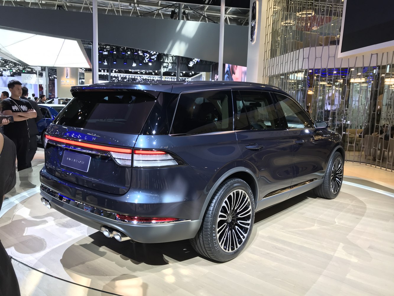 Rear view of SUV with LED tail light bar and multi-spoke alloy wheels