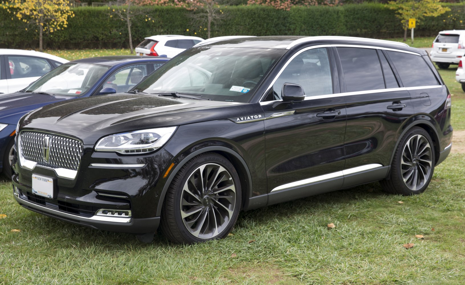 Black luxury SUV with LED headlights and stylish alloy wheels