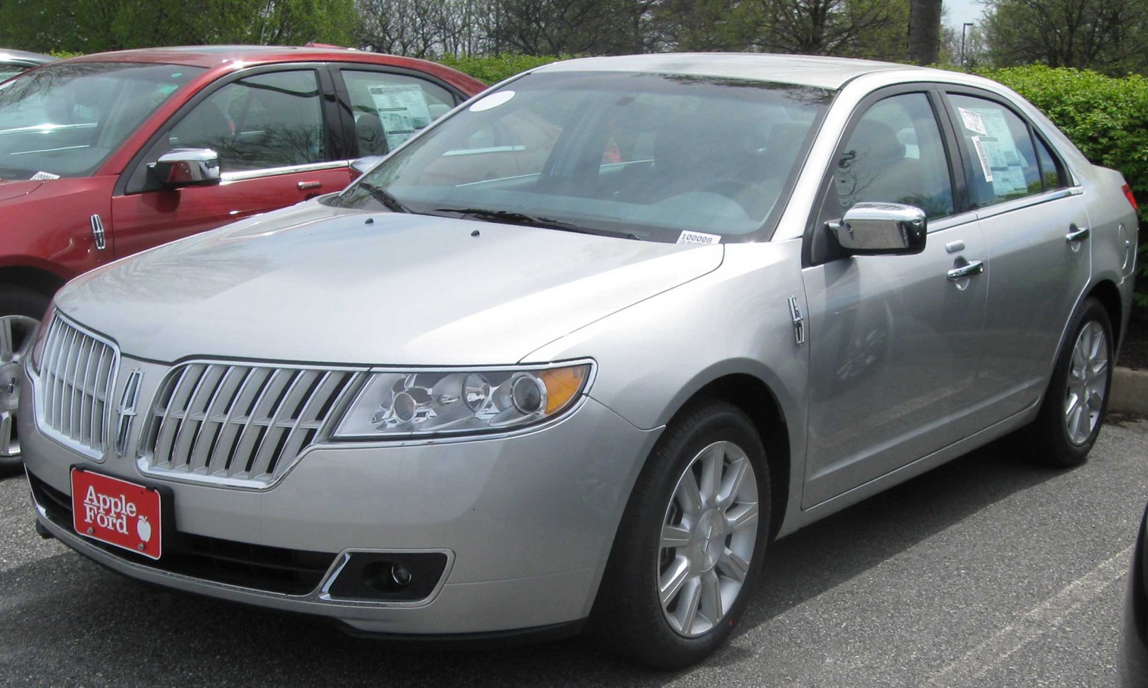 Silver sedan with chrome grille and alloy wheels