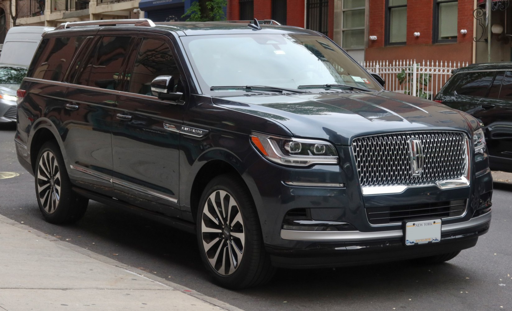 Luxurious SUV with prominent front grille and modern LED headlights