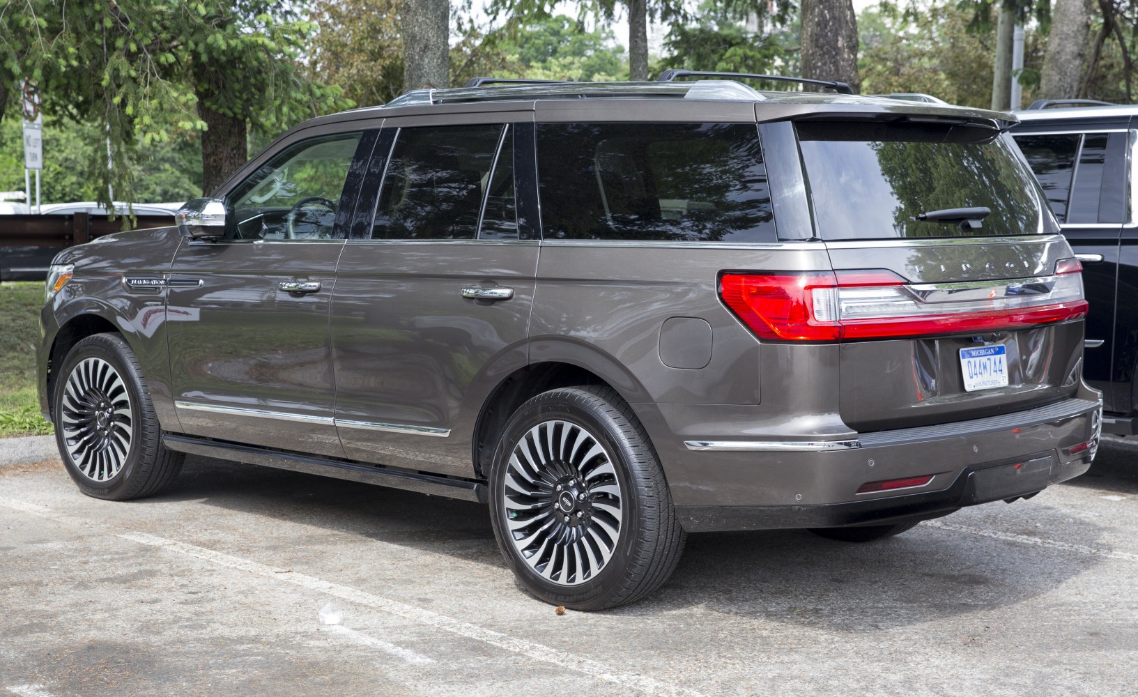 Rear side profile with LED taillights and distinctive wheel design