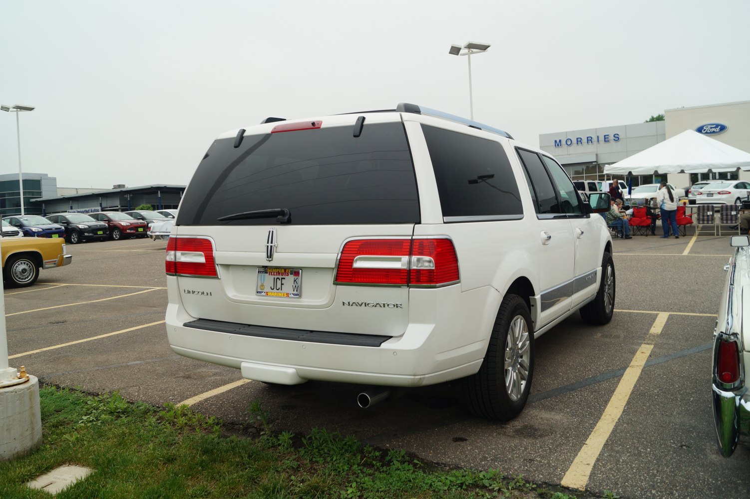 SUV rear with tinted windows and red tail lights