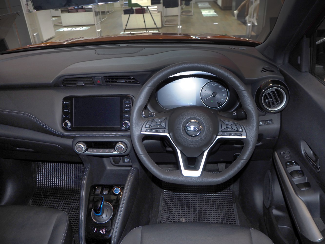 Dashboard, steering wheel, and center console of car interior