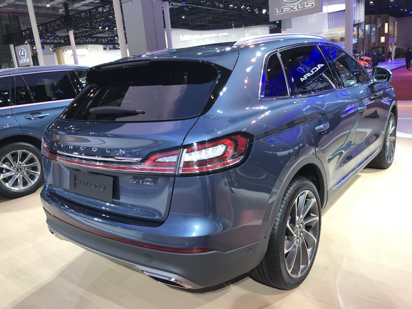Rear view of SUV with distinctive taillights and AWD emblem