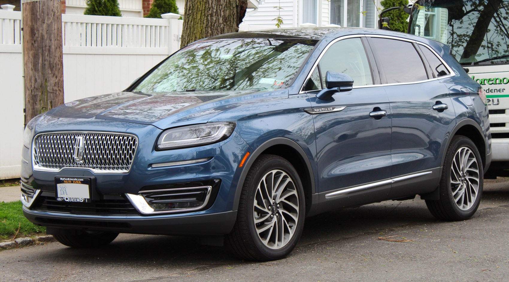 SUV front side showing distinctive grille and LED headlights