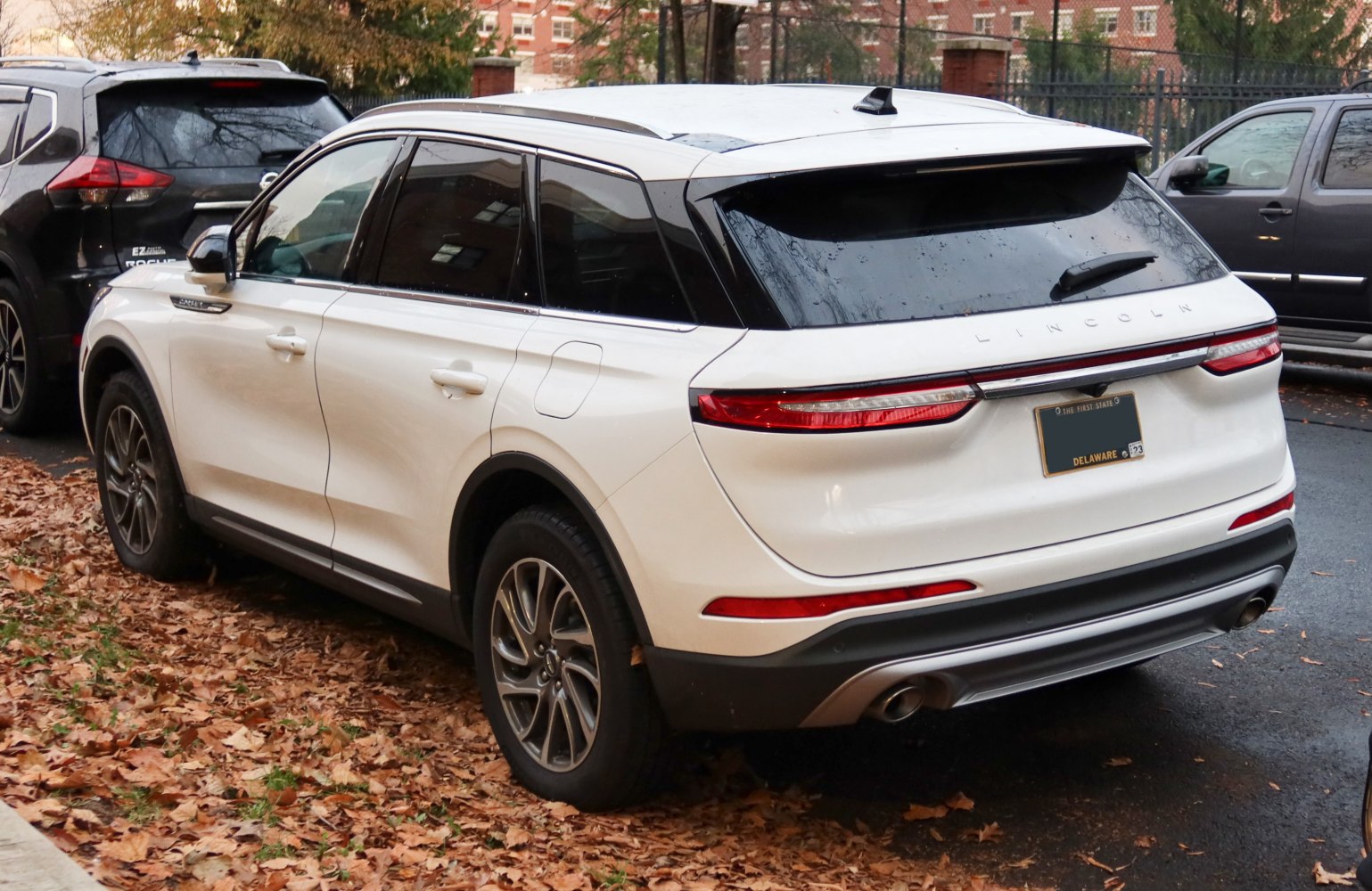 Rear view of SUV with sleek tail lights and dual exhaust